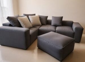 Wygodna, grafitowa kanapa narożna z prostym designem, idealna do współczesnego salonu - Esperanza